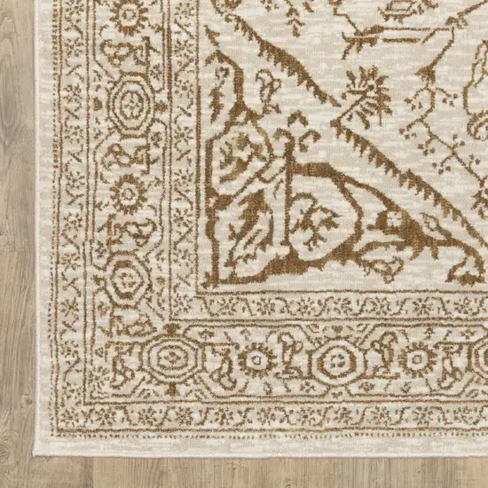 Ivory And Gold Oriental Area Rug Photo 4