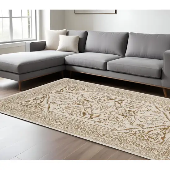 Ivory And Gold Oriental Area Rug Photo 1