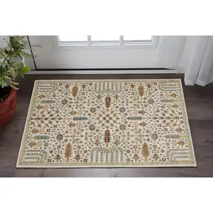 Photo of Ivory And Gold Oriental Area Rug