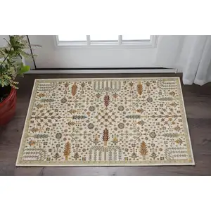 Photo of Ivory And Gold Oriental Area Rug