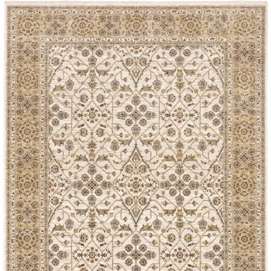 Ivory And Gold Oriental Power Loom Stain Resistant Area Rug With Fringe Photo 11