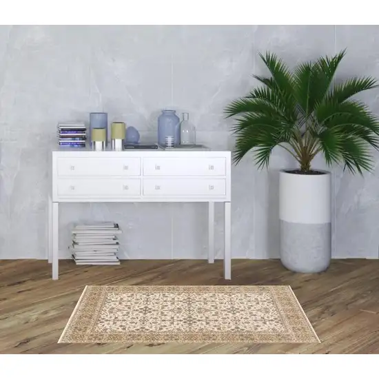 Ivory And Gold Oriental Power Loom Stain Resistant Area Rug With Fringe Photo 2