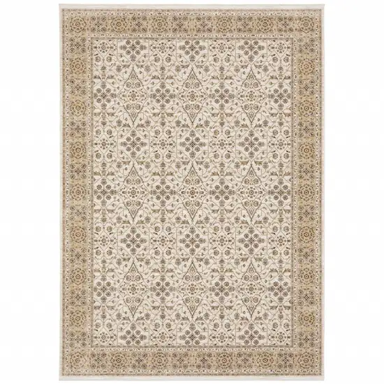 Ivory And Gold Oriental Power Loom Stain Resistant Area Rug With Fringe Photo 1