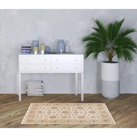 Ivory And Gold Oriental Power Loom Stain Resistant Area Rug With Fringe Photo 2