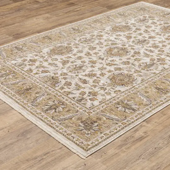 Ivory And Gold Oriental Power Loom Stain Resistant Area Rug With Fringe Photo 6