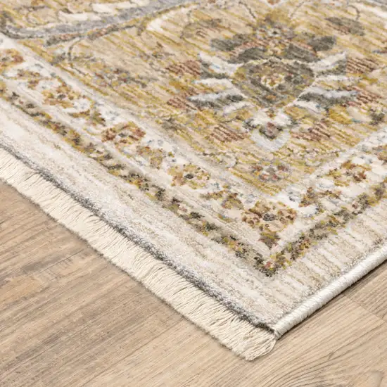 Ivory And Gold Oriental Power Loom Stain Resistant Area Rug With Fringe Photo 5