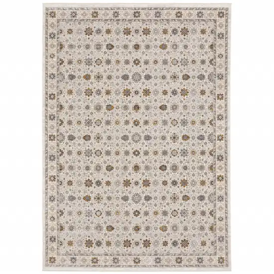 Ivory And Gold Oriental Power Loom Stain Resistant Area Rug With Fringe Photo 1