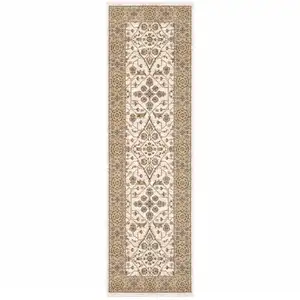 Photo of Ivory And Gold Oriental Power Loom Stain Resistant Runner Rug With Fringe