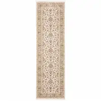Photo of Ivory And Gold Oriental Power Loom Stain Resistant Runner Rug With Fringe