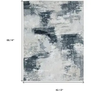 Photo of Ivory And Gray Abstract Distressed Area Rug