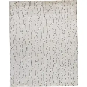 Photo of Ivory And Gray Abstract Hand Woven Area Rug