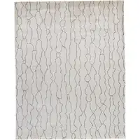 Photo of Ivory And Gray Abstract Hand Woven Area Rug