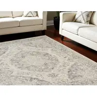 Photo of Ivory And Gray Floral Medallion Distressed Area Rug