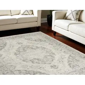 Photo of Ivory And Gray Floral Medallion Distressed Area Rug