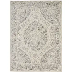 Photo of Ivory And Gray Floral Medallion Distressed Area Rug