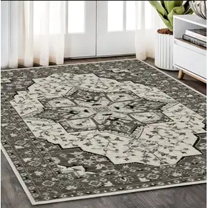 Photo of Ivory And Gray Medallion Area Rug With Fringe