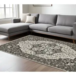 Photo of Ivory And Gray Medallion Area Rug With Fringe