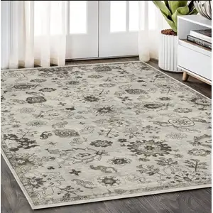 Photo of Ivory And Gray Oriental Area Rug With Fringe