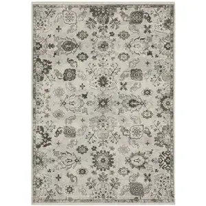 Photo of Ivory And Gray Oriental Area Rug With Fringe