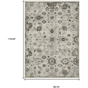 Photo of Ivory And Gray Oriental Area Rug With Fringe