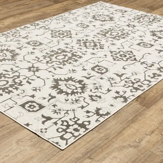 Ivory And Gray Oriental Area Rug Photo 4