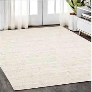 Photo of Ivory And Gray Striped Hand Tufted Area Rug