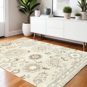 Photo of Ivory And Gray Wool Floral Hand Tufted Area Rug