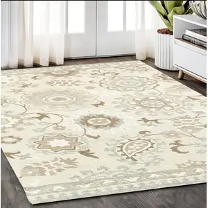 Photo of Ivory And Gray Wool Floral Hand Tufted Area Rug