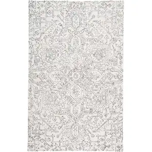 Photo of Ivory And Gray Wool Floral Tufted Handmade Stain Resistant Area Rug