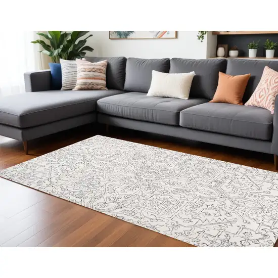 Ivory And Gray Wool Floral Tufted Handmade Stain Resistant Area Rug Photo 1