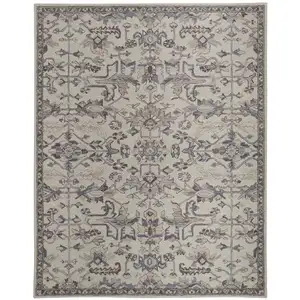 Photo of Ivory And Gray Wool Floral Tufted Handmade Stain Resistant Area Rug