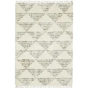 Photo of Ivory And Green Geometric Shag Area Rug With Fringe