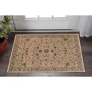 Photo of Ivory And Green Oriental Area Rug