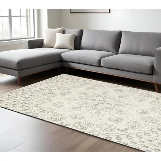 Gray and Ivory Floral Power Loom Area Rug Photo 1