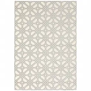 Photo of Ivory And Grey Geometric Power Loom Stain Resistant Area Rug