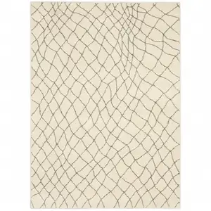 Photo of Ivory And Grey Geometric Power Loom Stain Resistant Area Rug