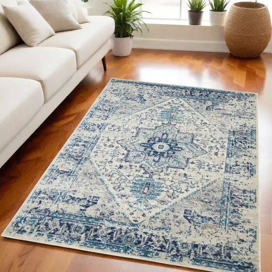 Ivory And Light Blue Floral Medallion Distressed Area Rug Photo 1