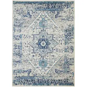 Photo of Ivory And Light Blue Floral Medallion Distressed Area Rug