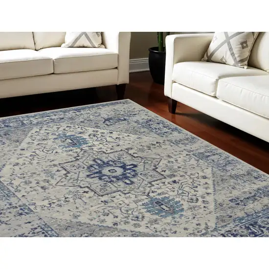 Ivory And Light Blue Floral Medallion Distressed Area Rug Photo 1