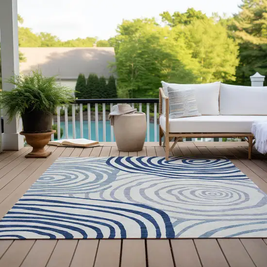 Ivory And Navy Blue Abstract Washable Indoor Outdoor Area Rug Photo 9