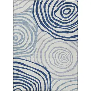 Photo of Ivory And Navy Blue Abstract Washable Indoor Outdoor Area Rug