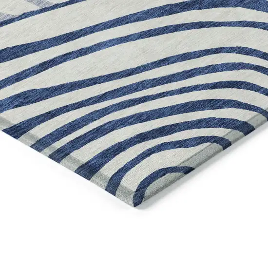 Ivory And Navy Blue Abstract Washable Indoor Outdoor Area Rug Photo 3