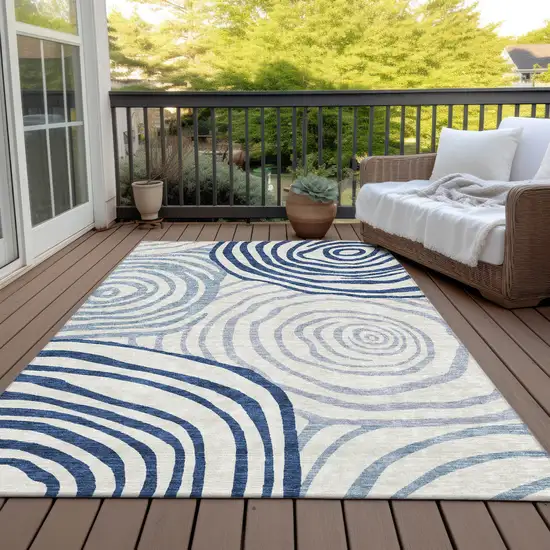 Ivory And Navy Blue Abstract Washable Indoor Outdoor Area Rug Photo 6