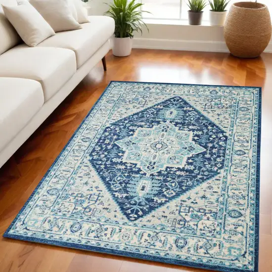 Ivory And Navy Blue Floral Medallion Distressed Area Rug Photo 1