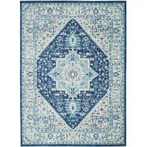 Photo of Ivory And Navy Blue Floral Medallion Distressed Area Rug