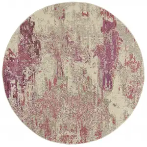 Photo of Ivory And Pink Round Abstract Power Loom Non Skid Area Rug