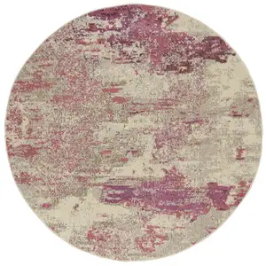 Photo of Ivory And Pink Round Abstract Power Loom Non Skid Area Rug