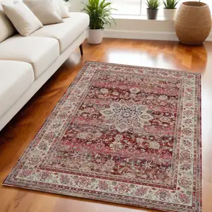 Photo of Ivory And Red Floral Distressed Area Rug