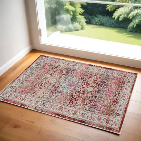 Ivory And Red Floral Distressed Area Rug Photo 1