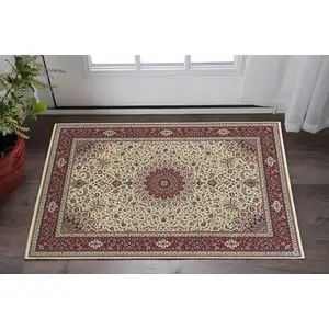 Photo of Ivory And Red Oriental Area Rug